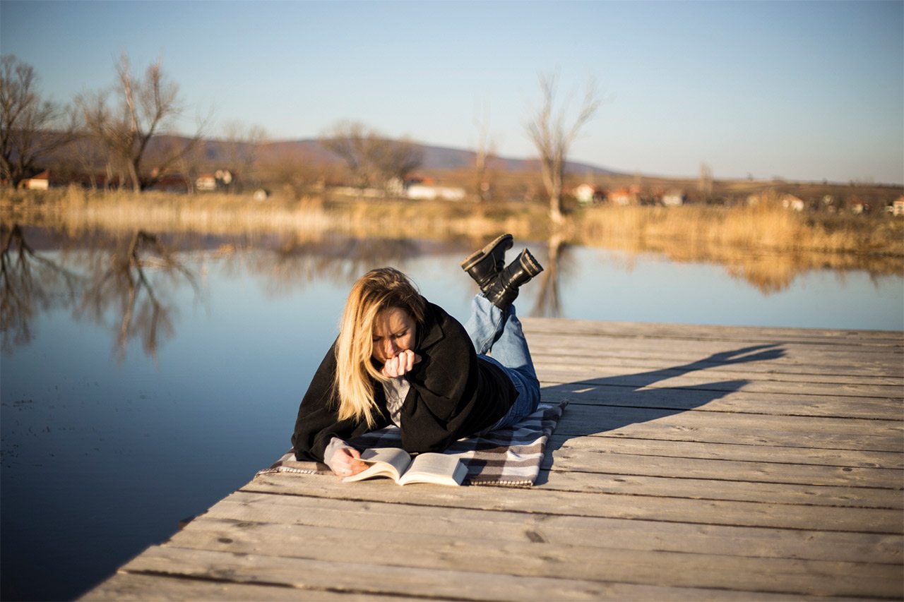 Girl reading stock