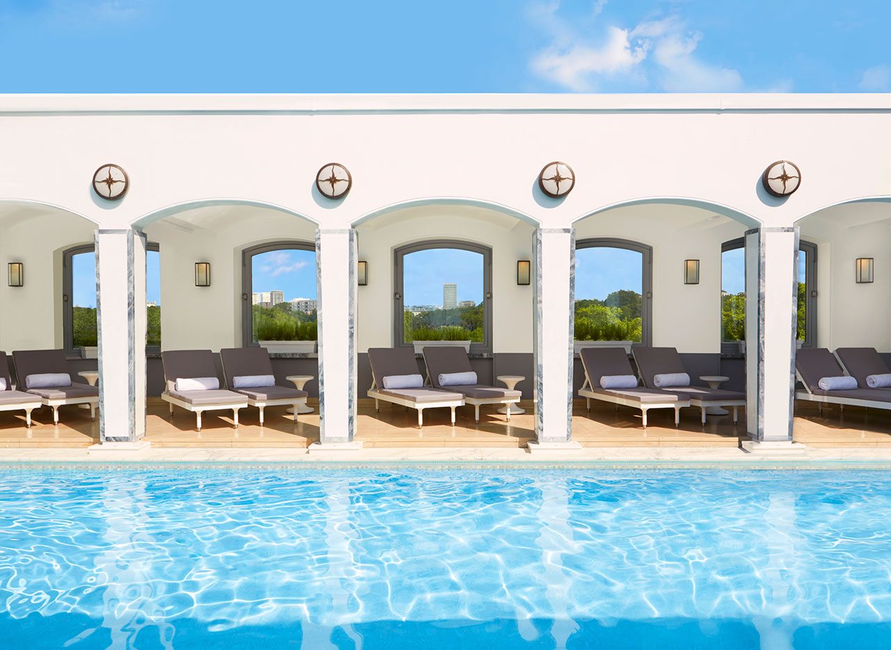 Rooftop swimming pool and sun loungers at The Berkeley Spa