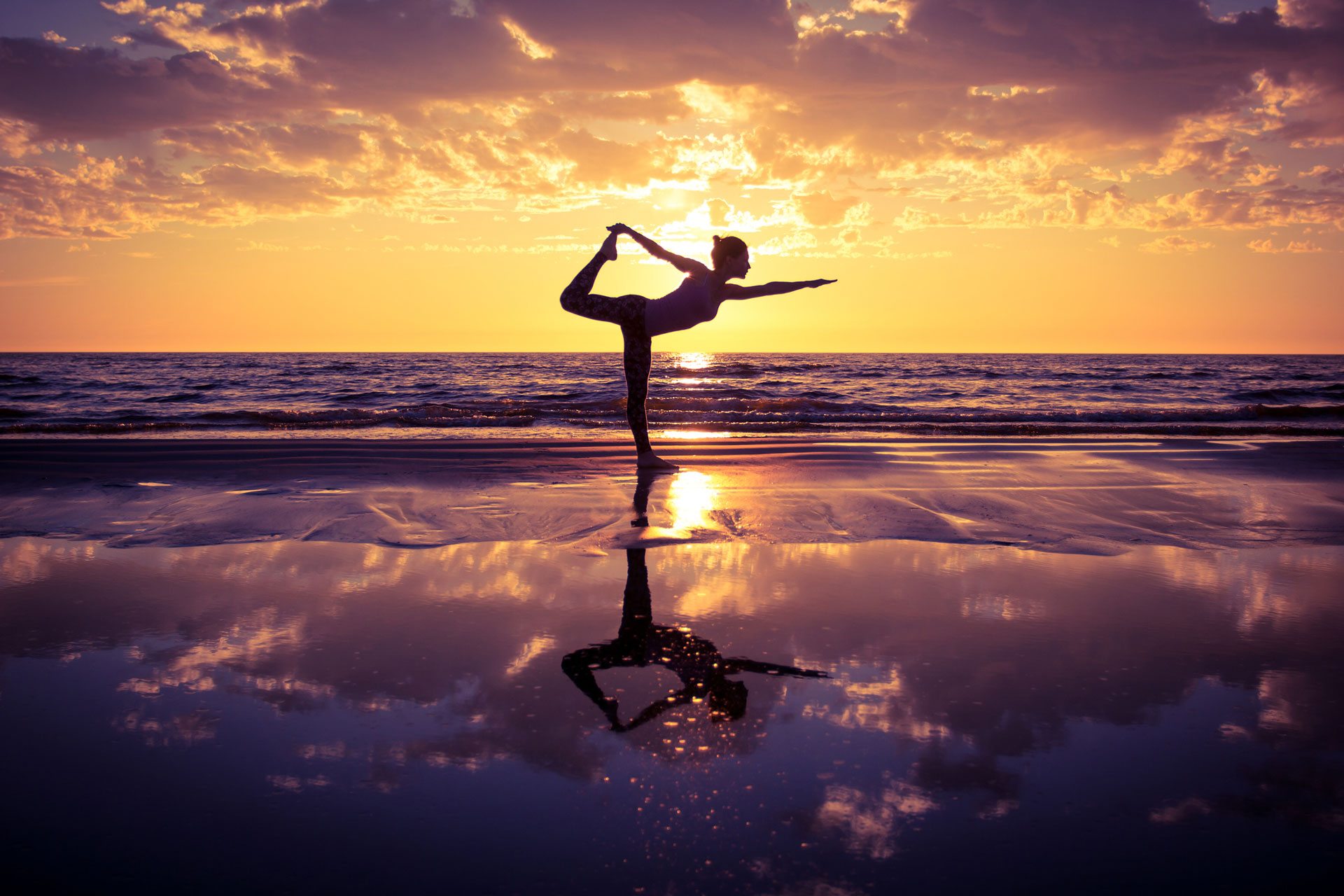 Conscious living: yoga on the beach