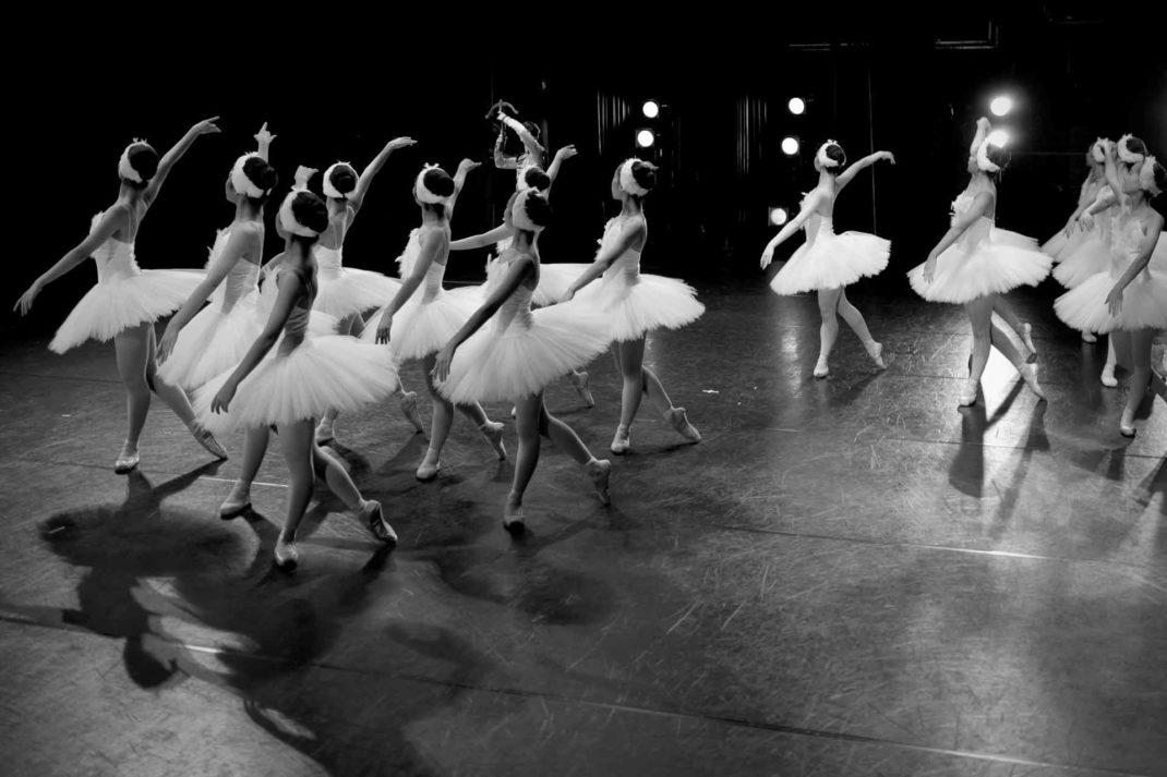 ballet class performing a dance