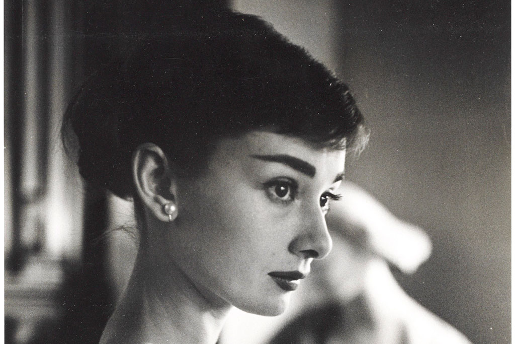 PHOTOGRAPHER UNKNOWN Audrey Hepburn, c.1956 gelatin silver print 13 ½ x 9 1/8 in. (34.3 x 23.2 cm.) Estimate £500 - 800 