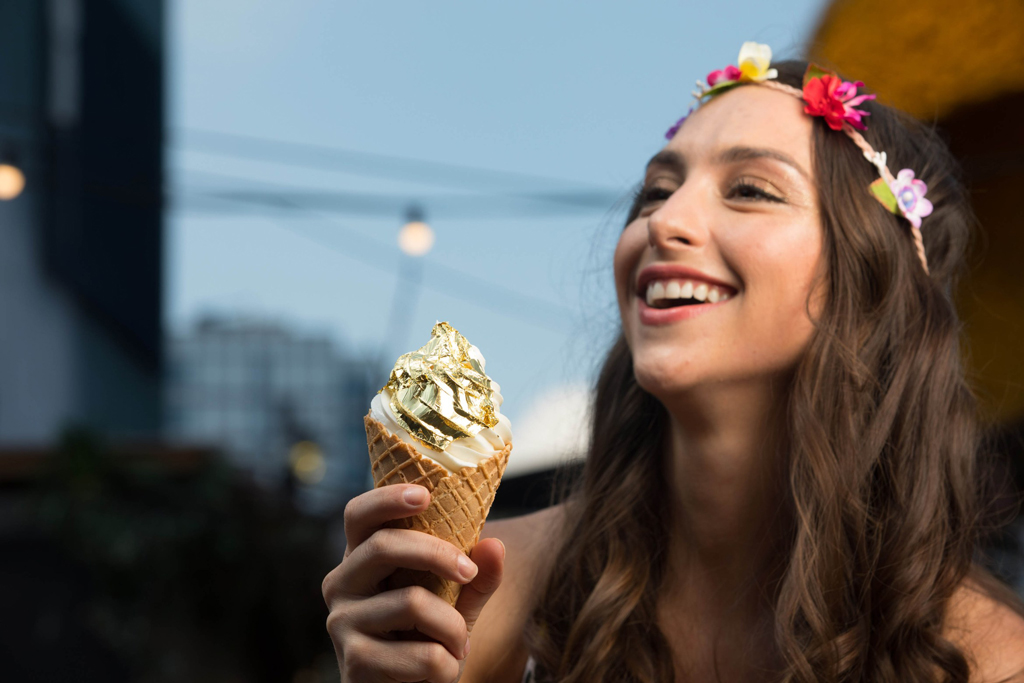 girl holding Gold Leaf Ice Cream