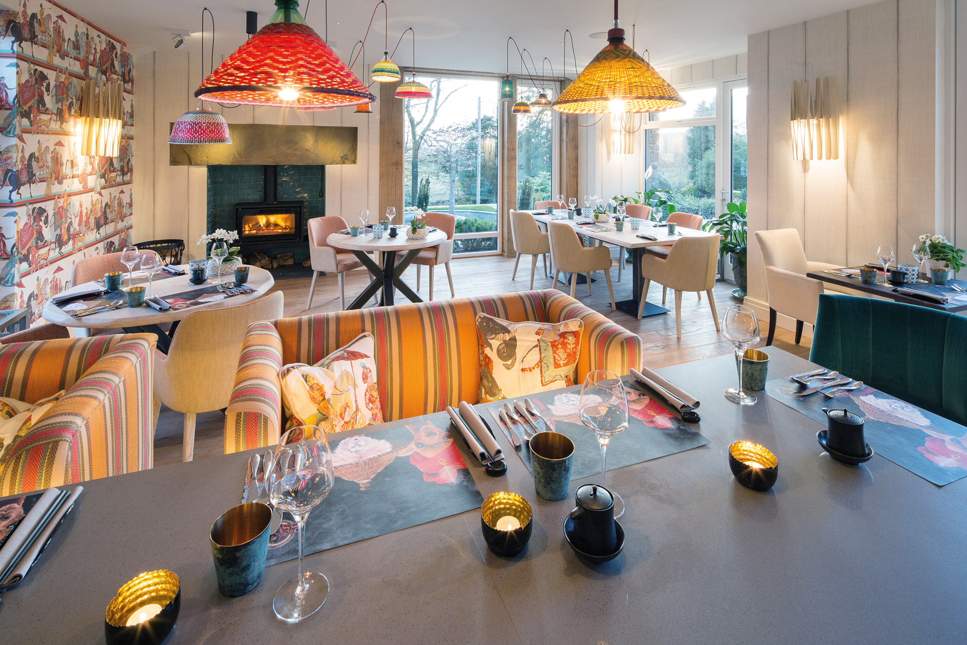 Open plan kitchen and dining room in warm lighting