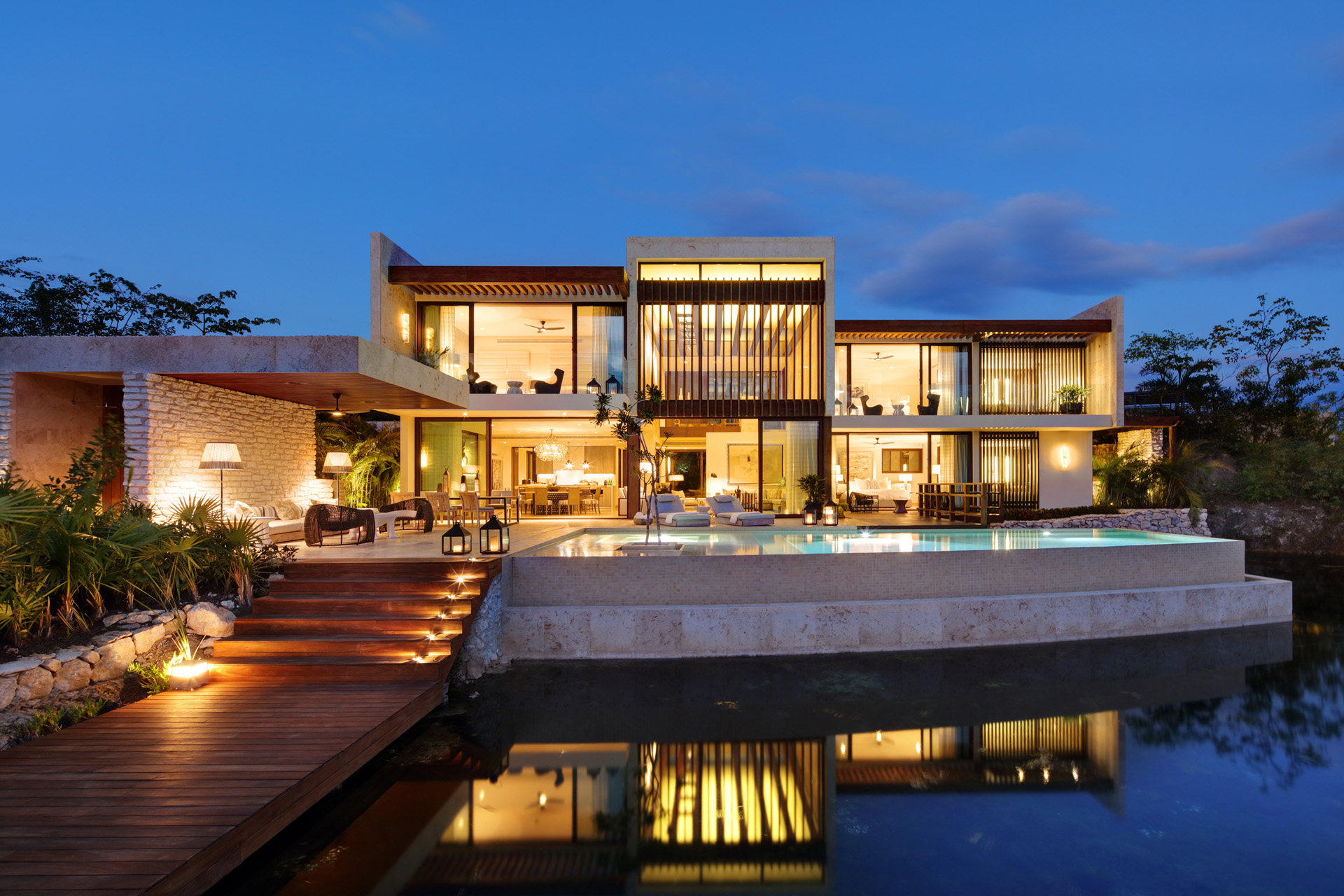 a villa with a swimming pool at Rosewood Mayakoba