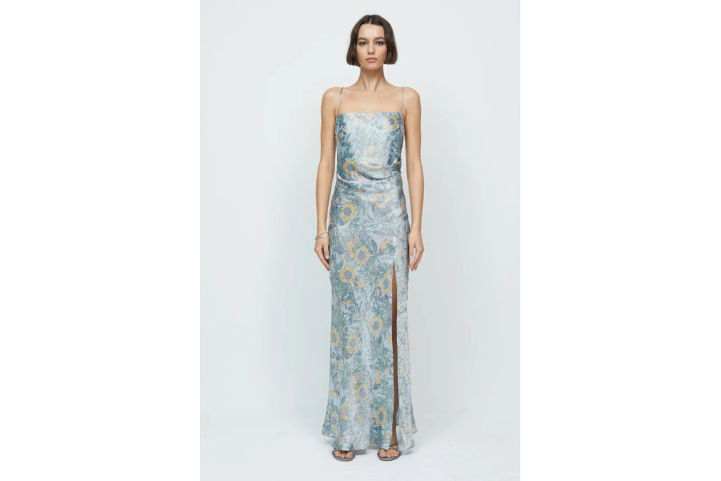 Woman in blue floral dress