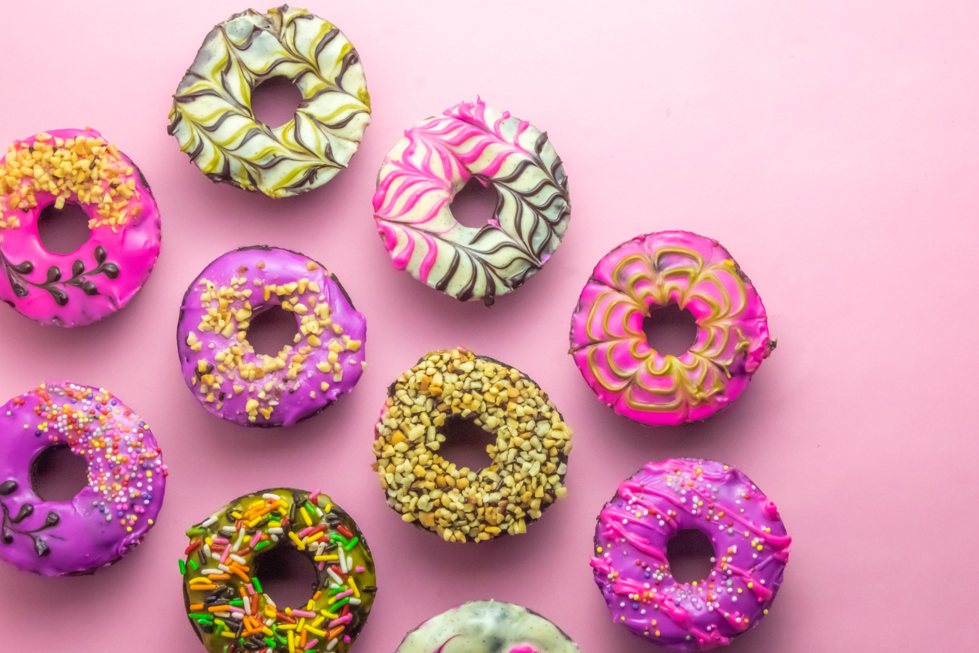 Doughnuts on pink background