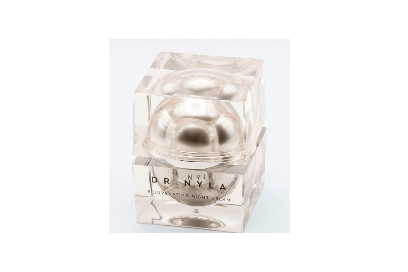 a crystal glass box with 'dr nyla' on the front