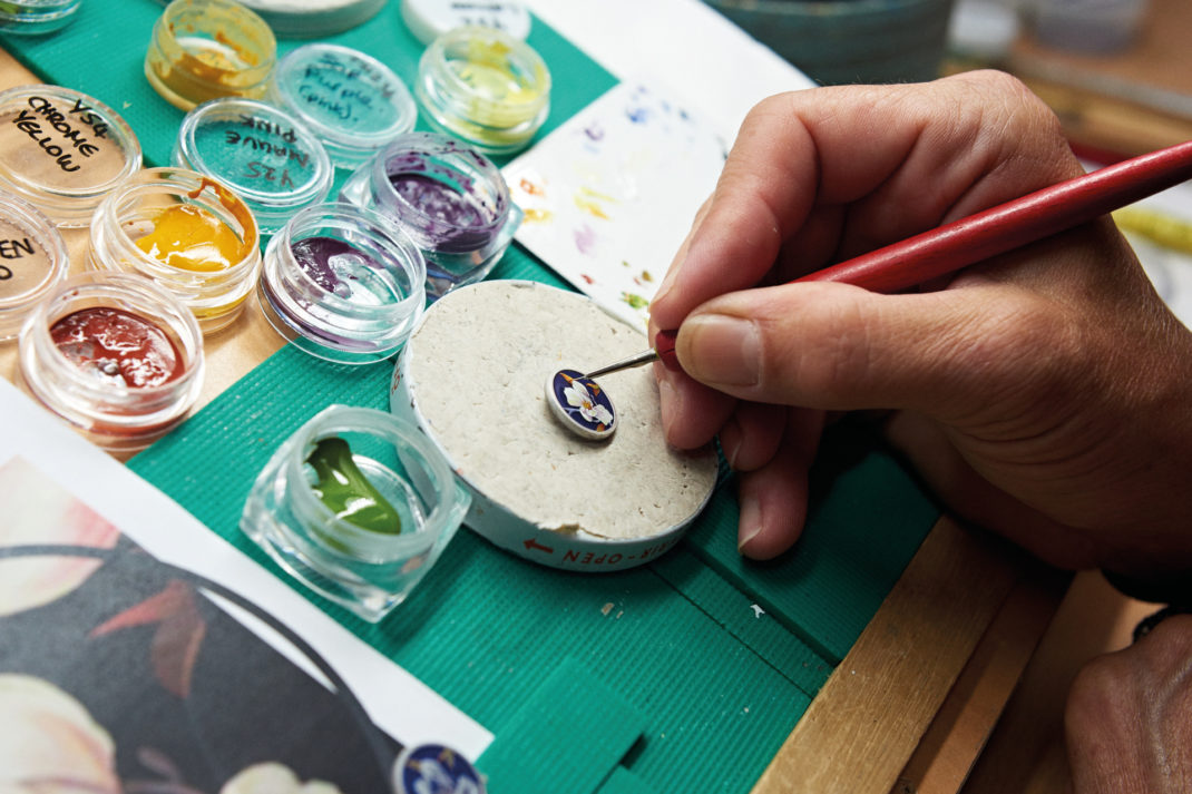 Cufflinks being decorated