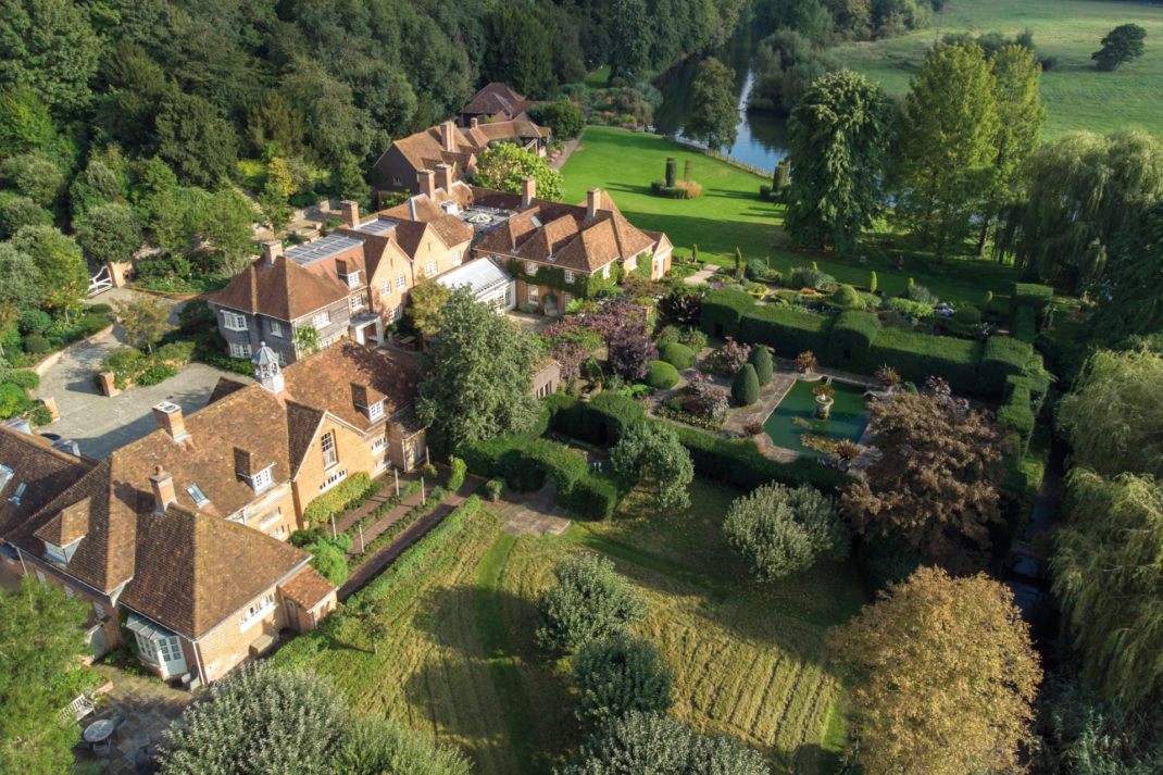 Aerial view of house and gardens by Randle Siddeley