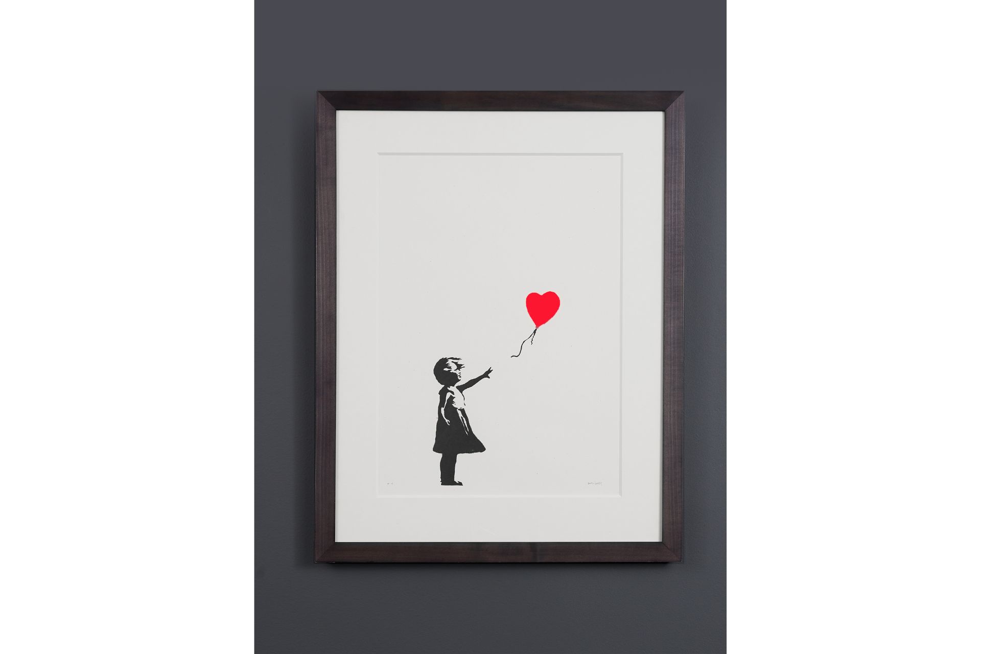 A Banksy artwork in a frame