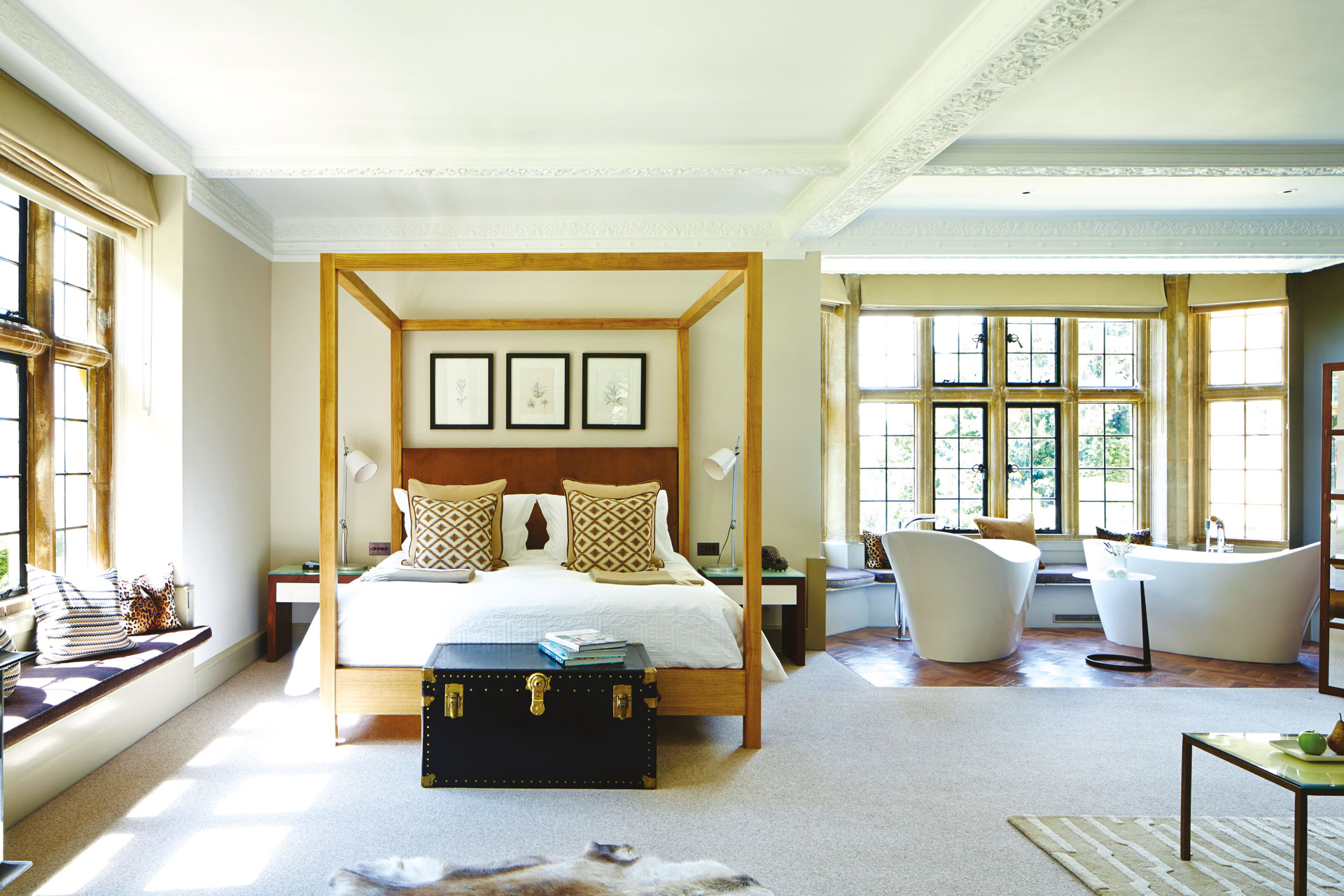A four posted bed in a bedroom at Foxhill Manor, Cotswolds