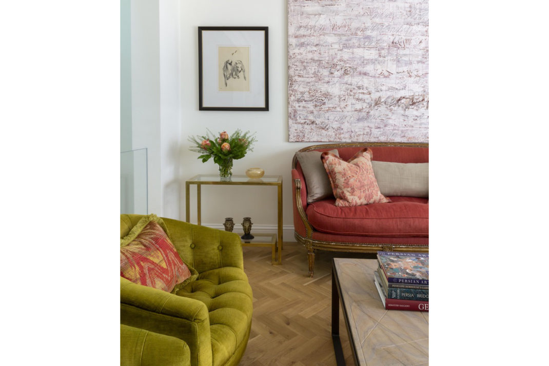 Blyth Collinson designed sitting room with green and red velvet sofas