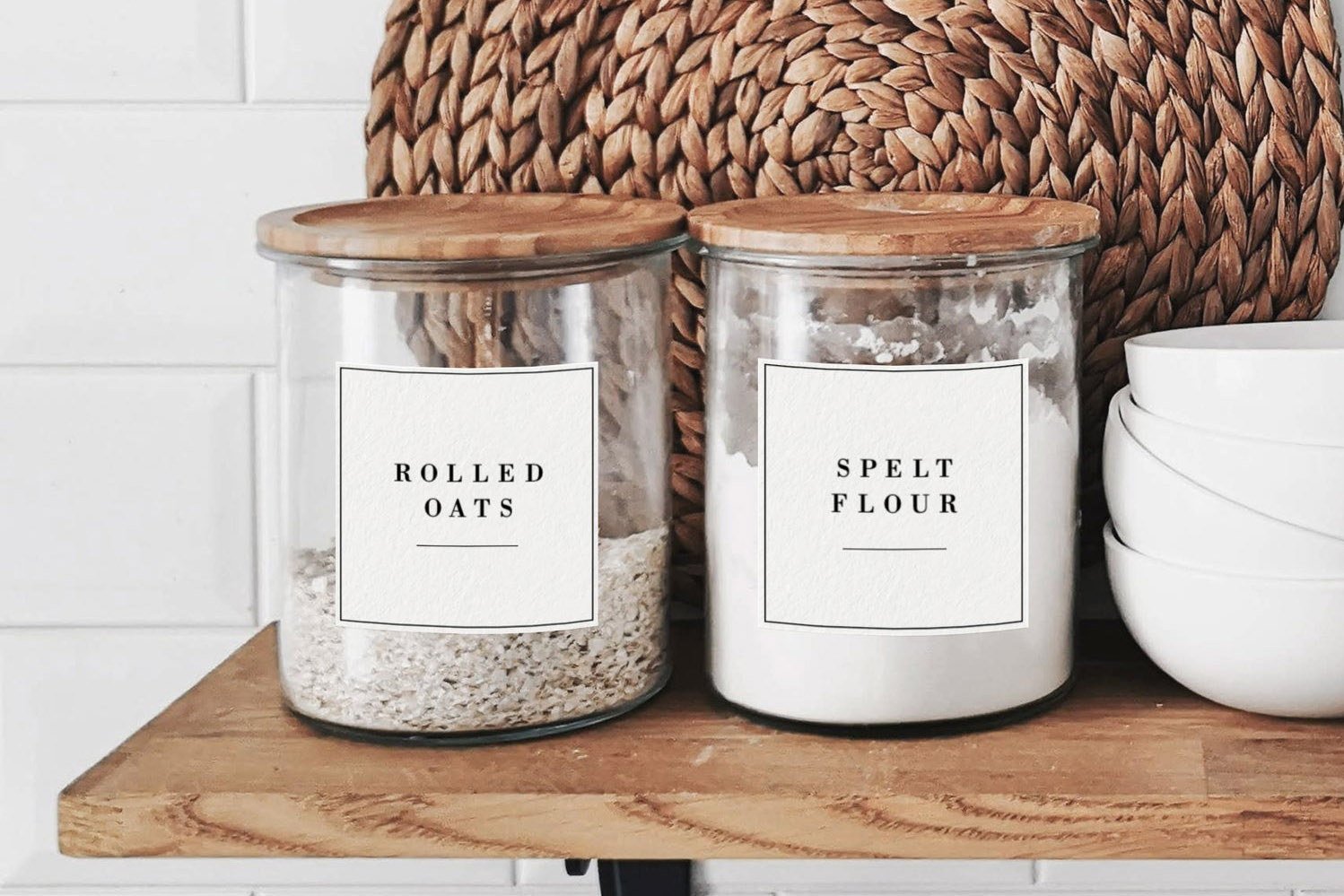 Flour and rolled out pantry labels on clear jars