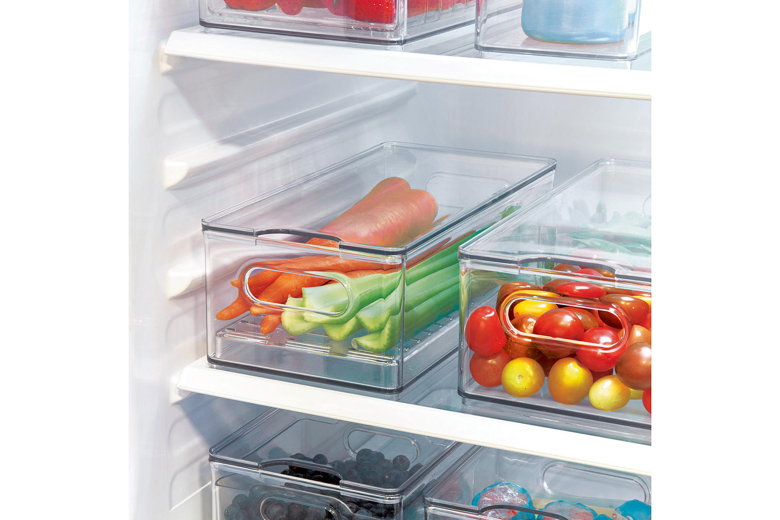 Acrylic stacked clear fridge vegetable draws with veg in