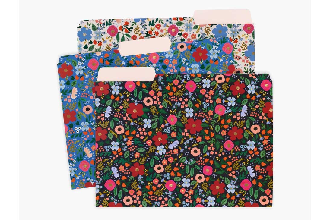 Three flower-patterned document holders in black, blue and cream