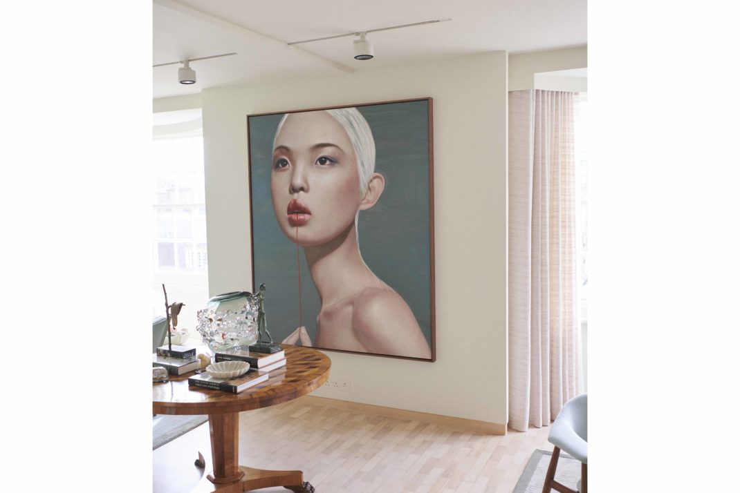 A piece of art in Wendy Goldsmith's home featuring a woman against a green backdrop