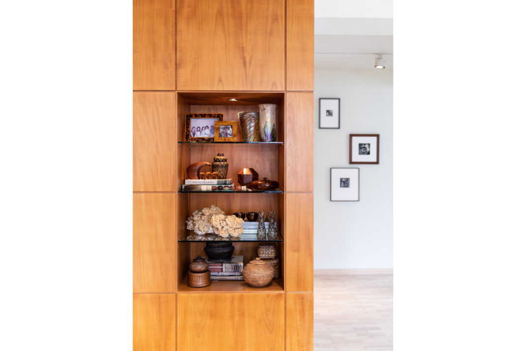 Wooden shelves decorated with art objects