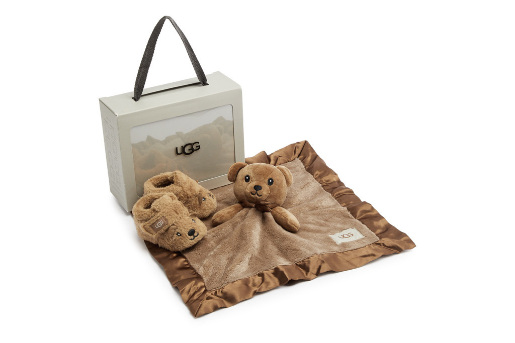 Small brown boots and bear blanket