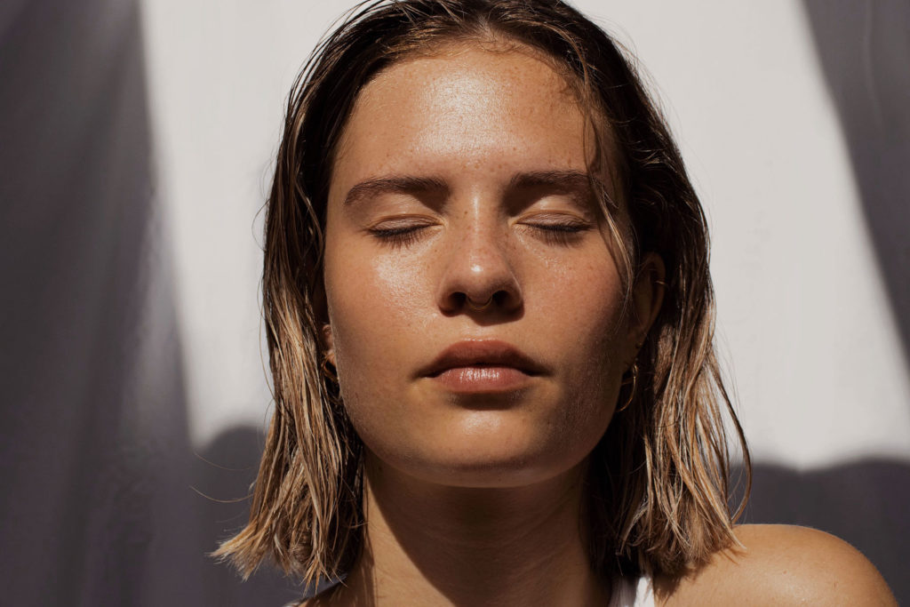woman's clean face to represent treatment cleansers