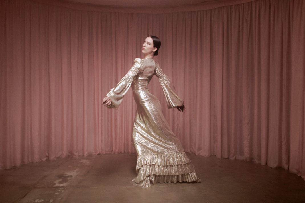woman in the vampires wife dress