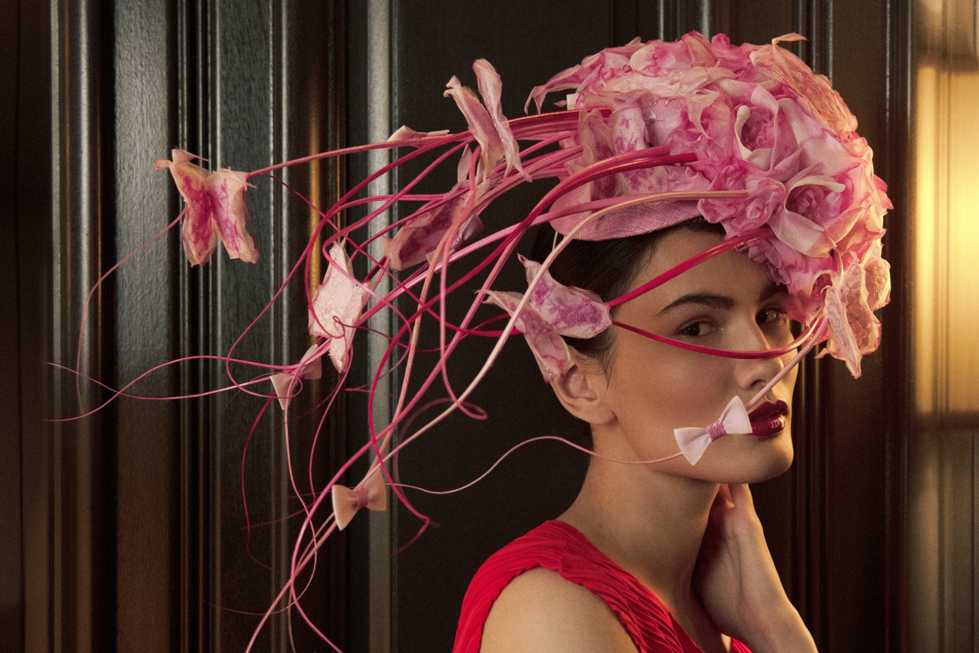 Model in pink floral hat for Ascot