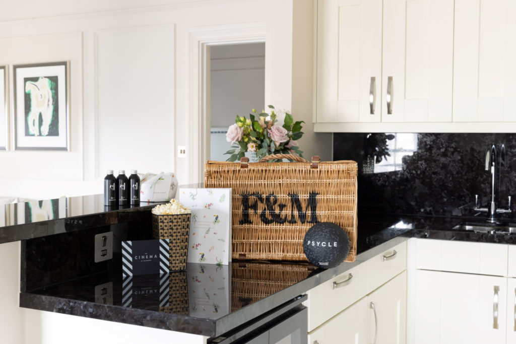 Kitchen counter with F&M hamper and goodies