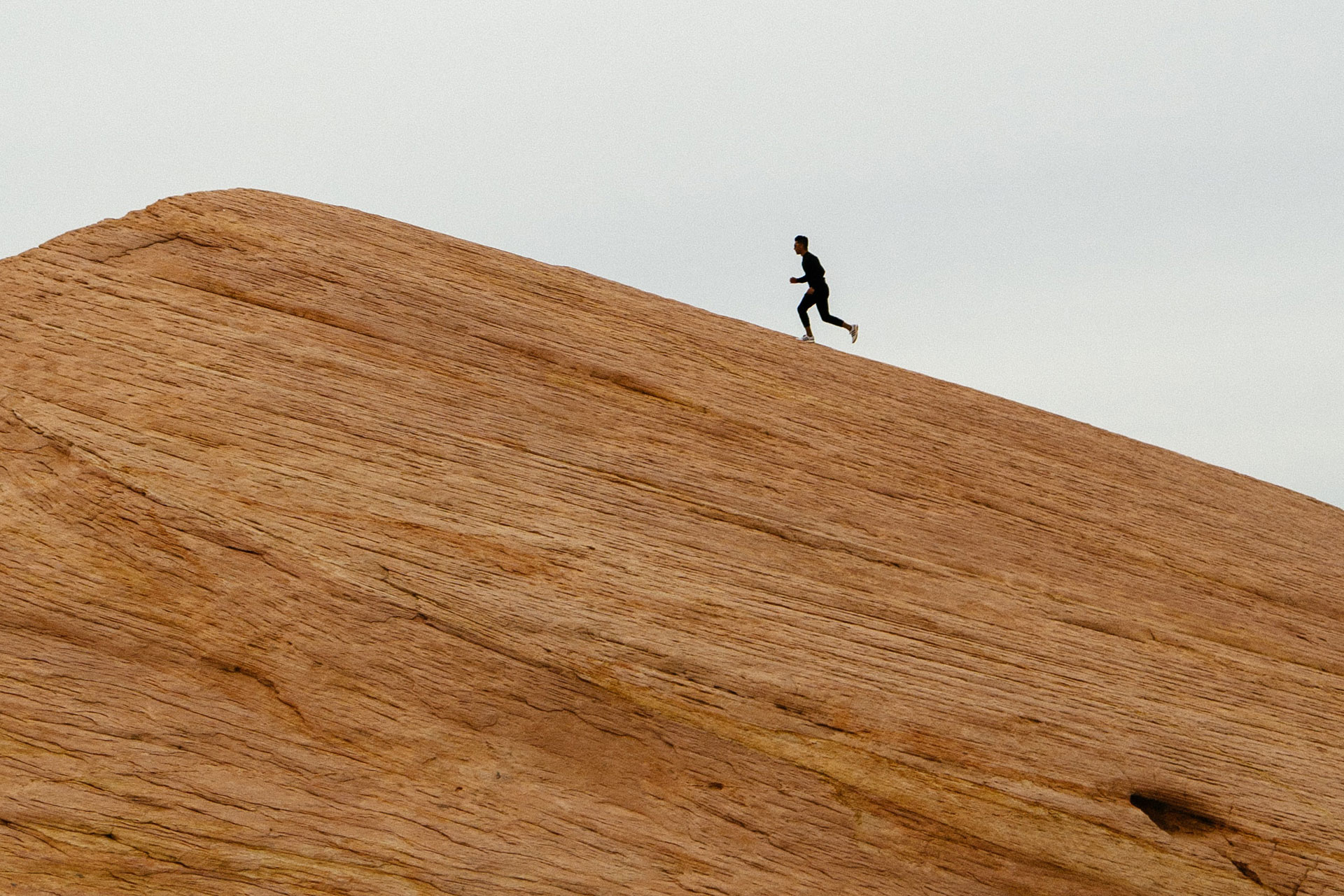 runner on a hill