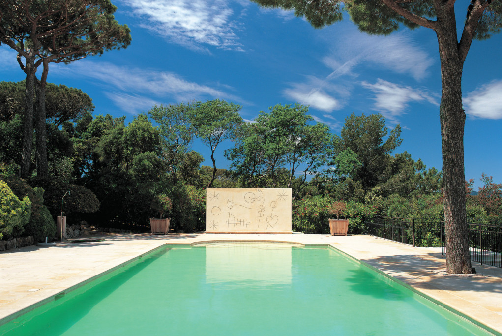 St Tropez pool with a mural