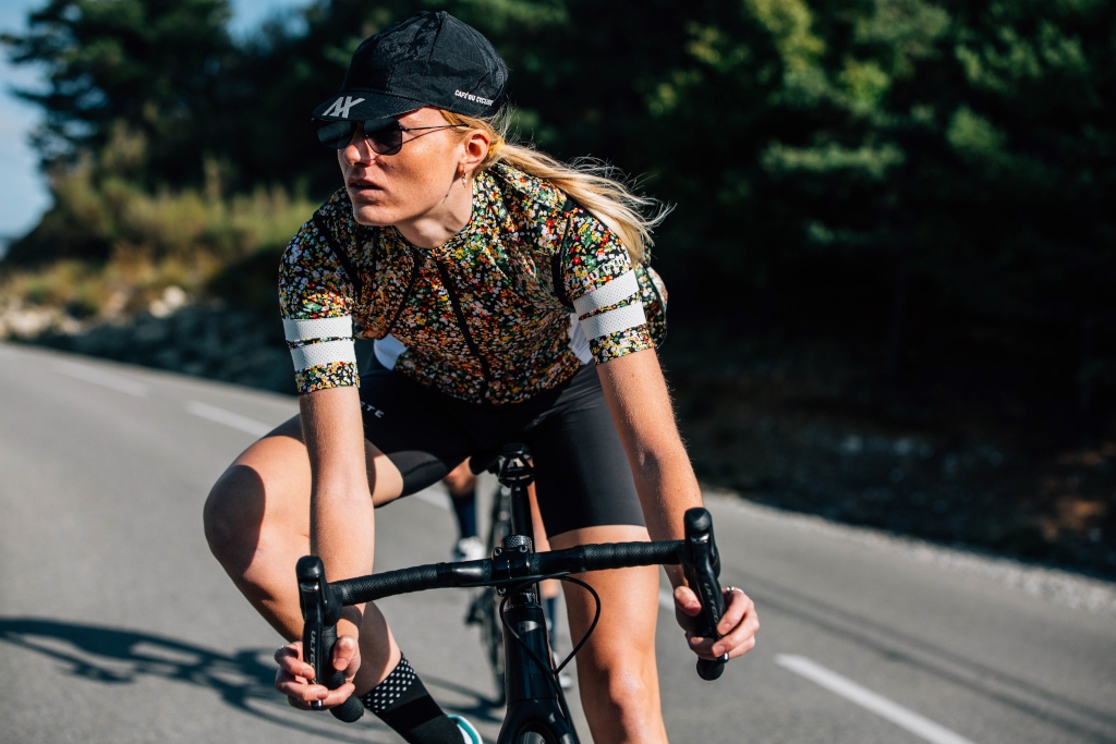 Cafe du Cycliste - woman cycling