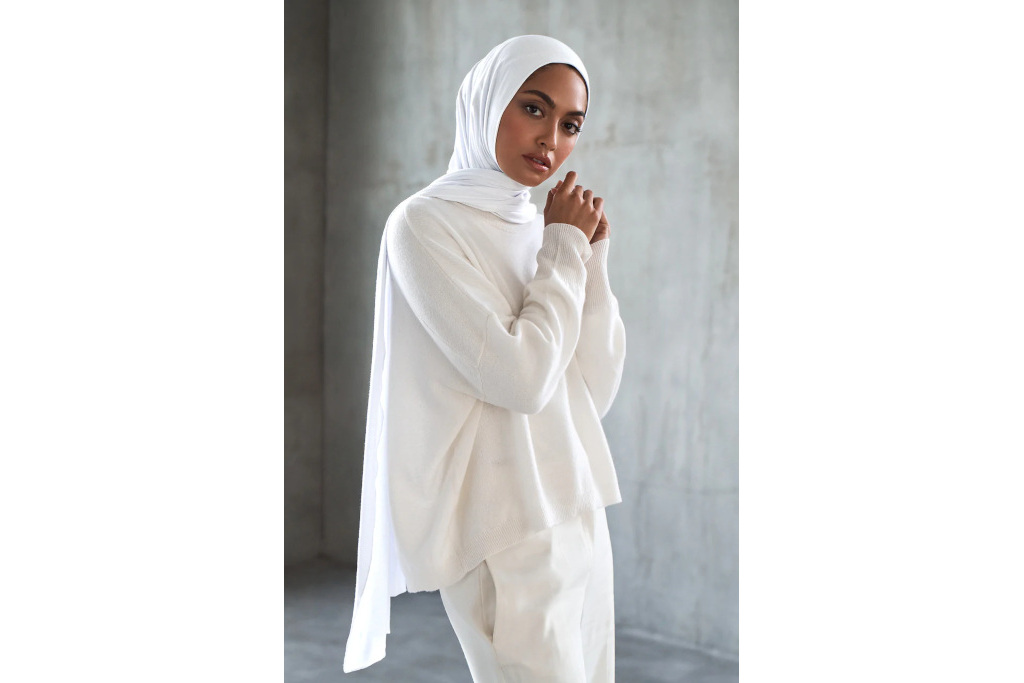 Woman wearing all-white in a hijab