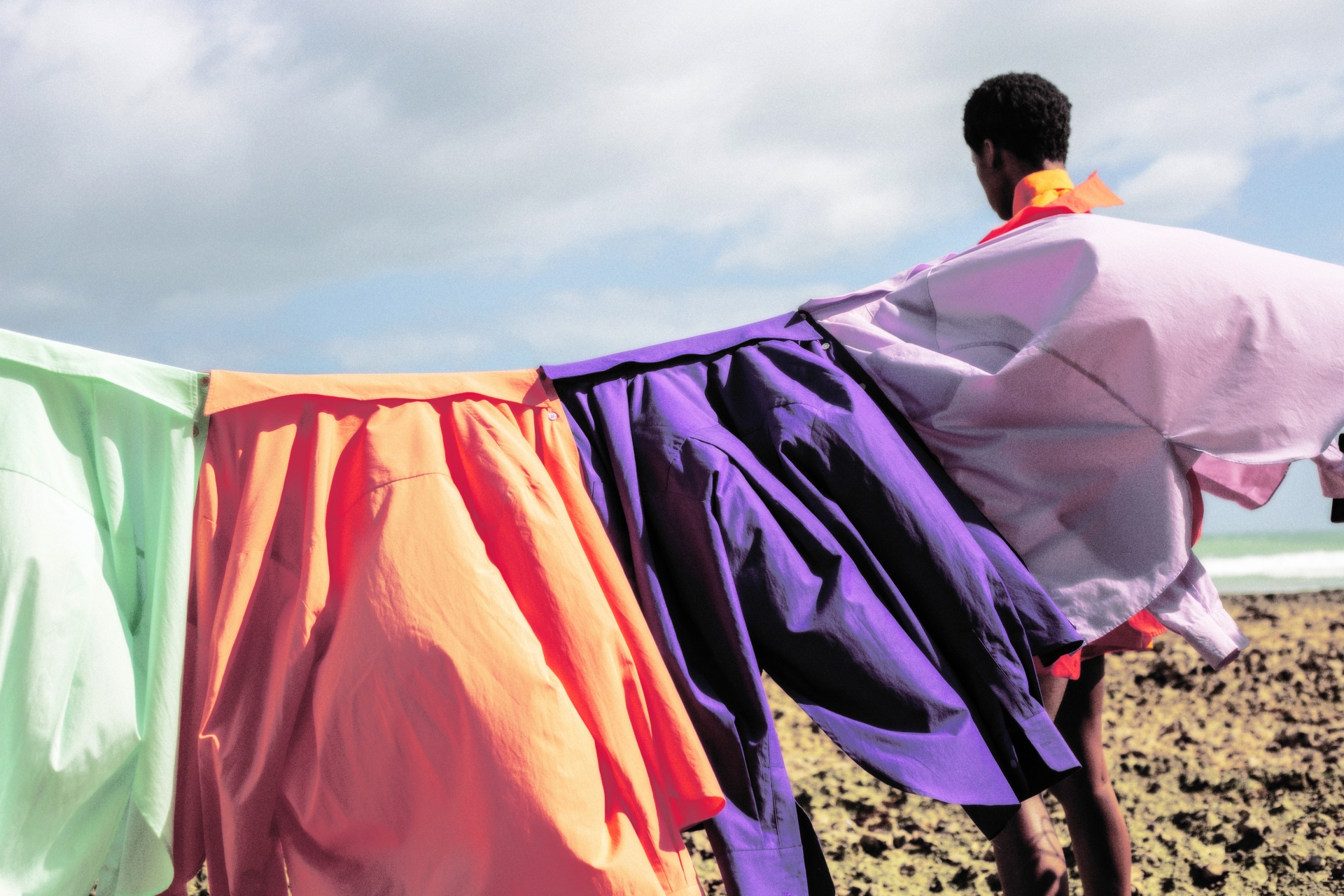 Autumn Brands - The Frankie Shop - colourful shirts hanging on the beach