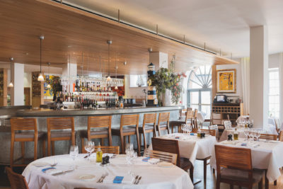 dining area with bar in background