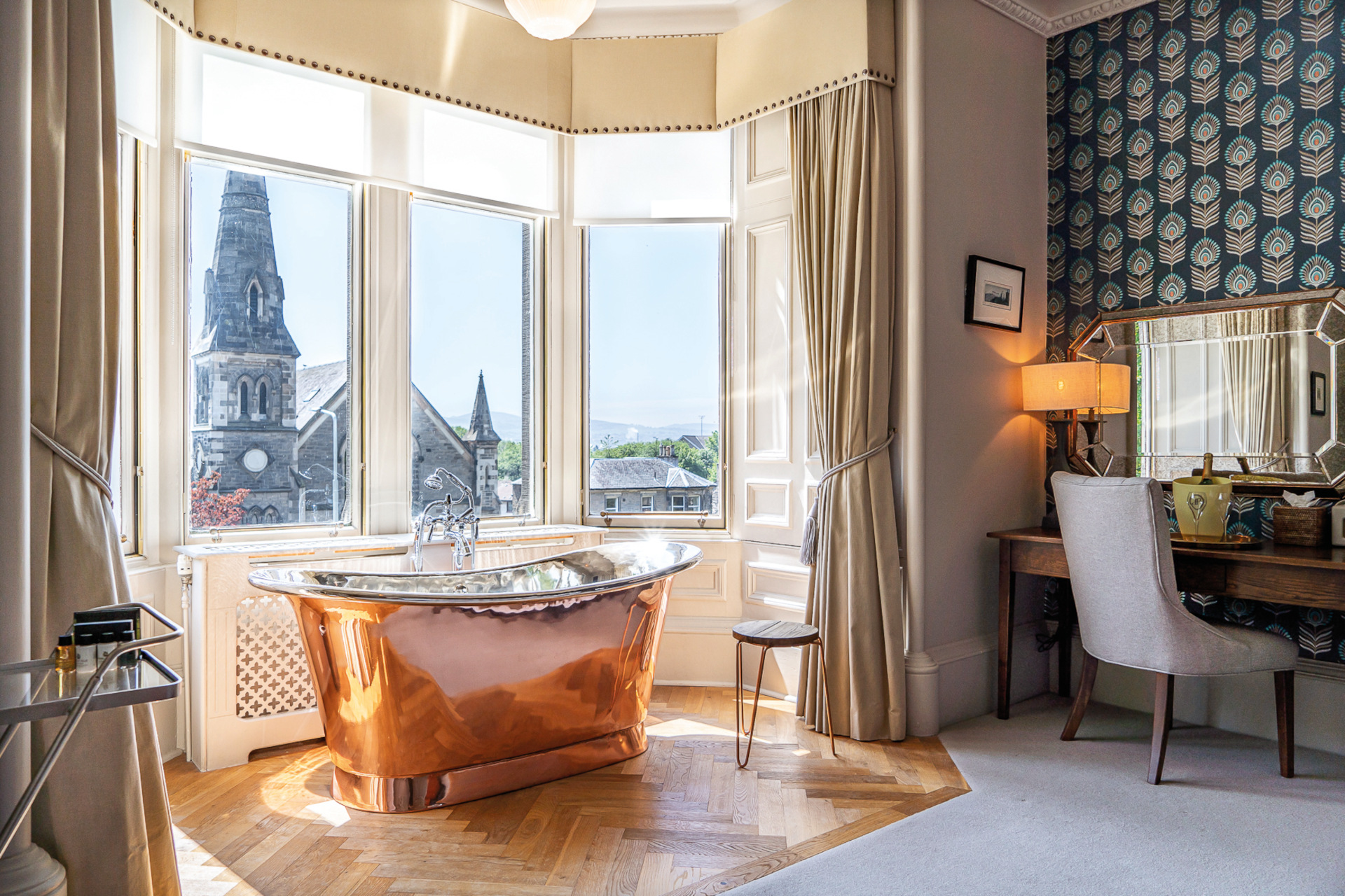 dunstane houses bathtub in hotel room next to view of edinburgh