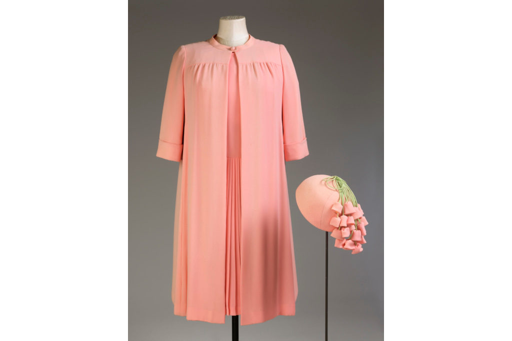 Outfit worn by Her Majesty The Queen on the occasion of her Silver Jubilee in 1977, designed by Sir Hardy Amies, and a matching hat by Simone Mirman