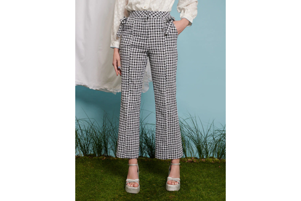 Woman in gingham trousers