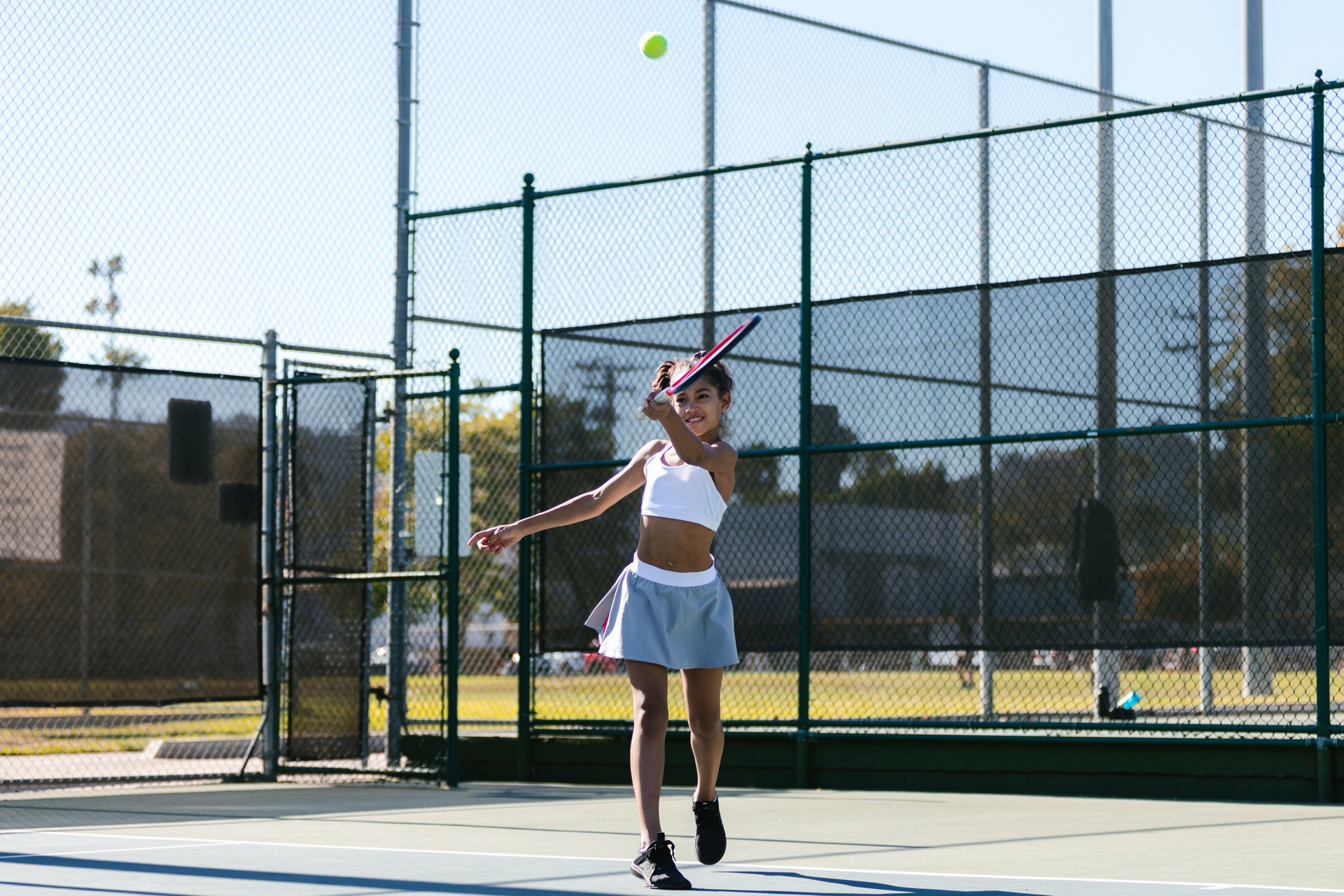 A girl playing tennis