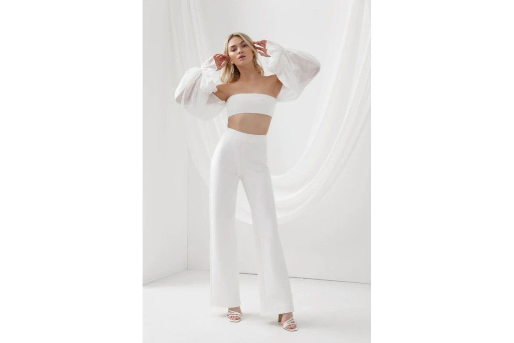 Woman in white jumpsuit