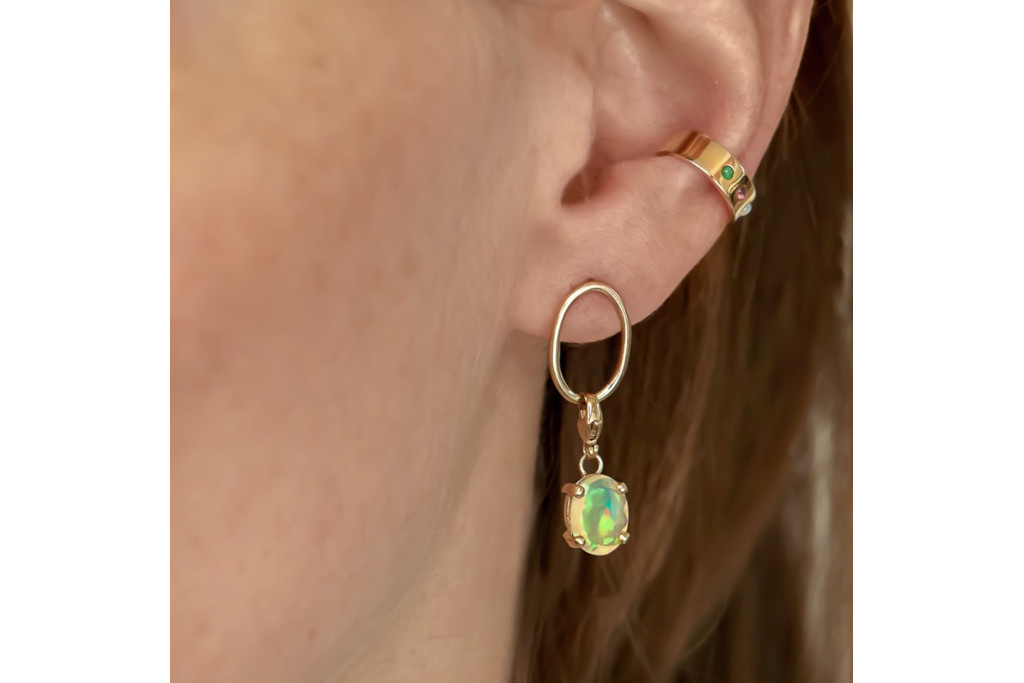 Close up of model's ear with earrings