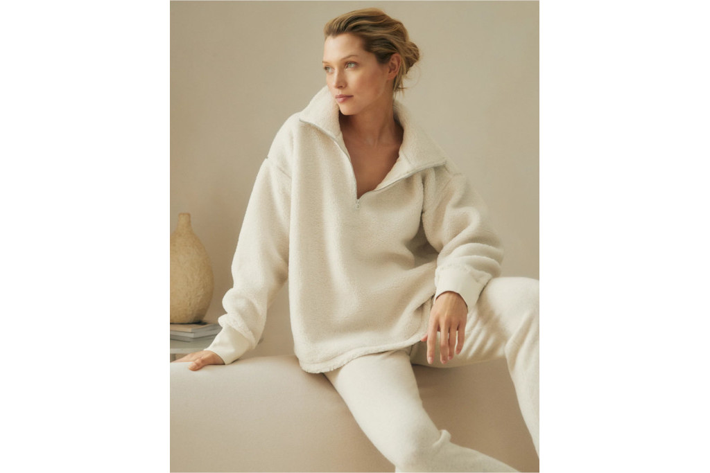 Woman in white jumper