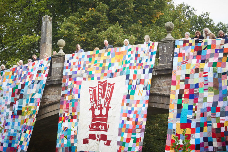 Prince Charles and Camilla Unveil a Giant Knitted Patchwork