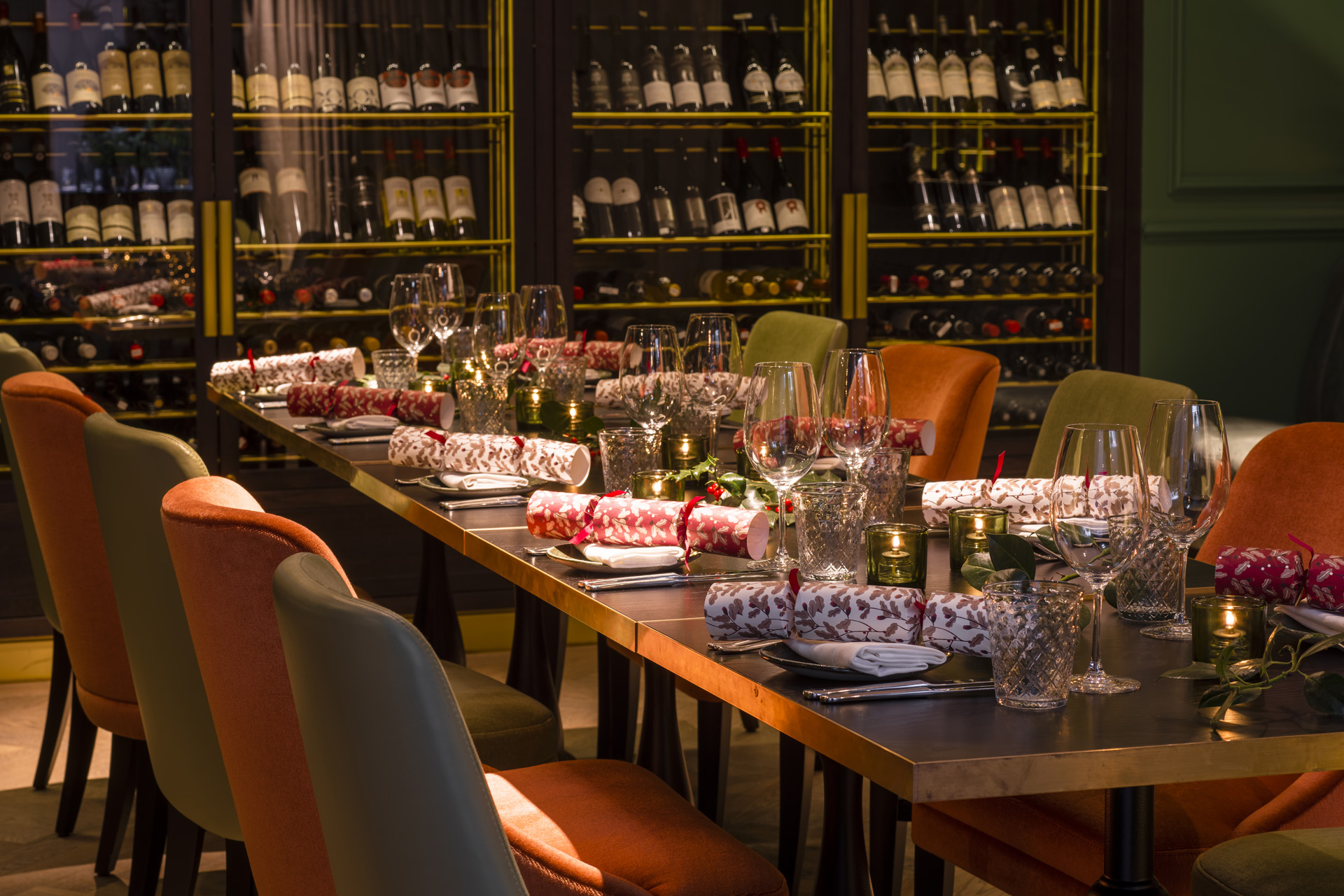 A table laid for Christmas dinner with crackers at 11 Cadogan Gardens