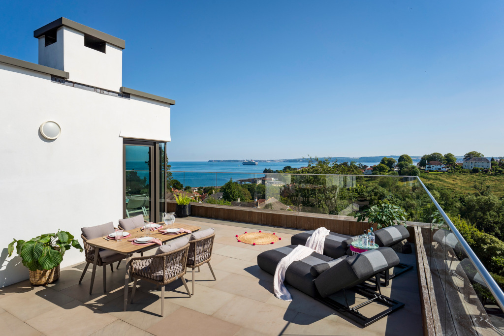 Devon house balcony overlooking sea