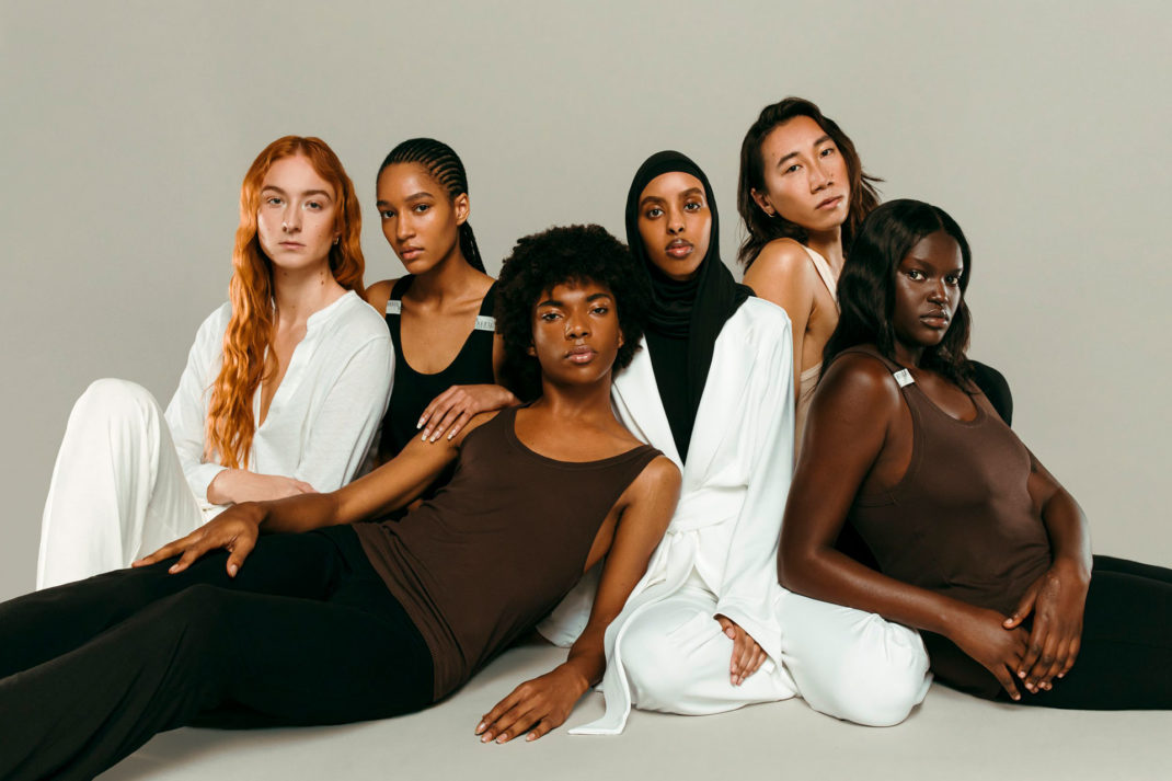 a group of gender neutral models pose for Harris Reed collection