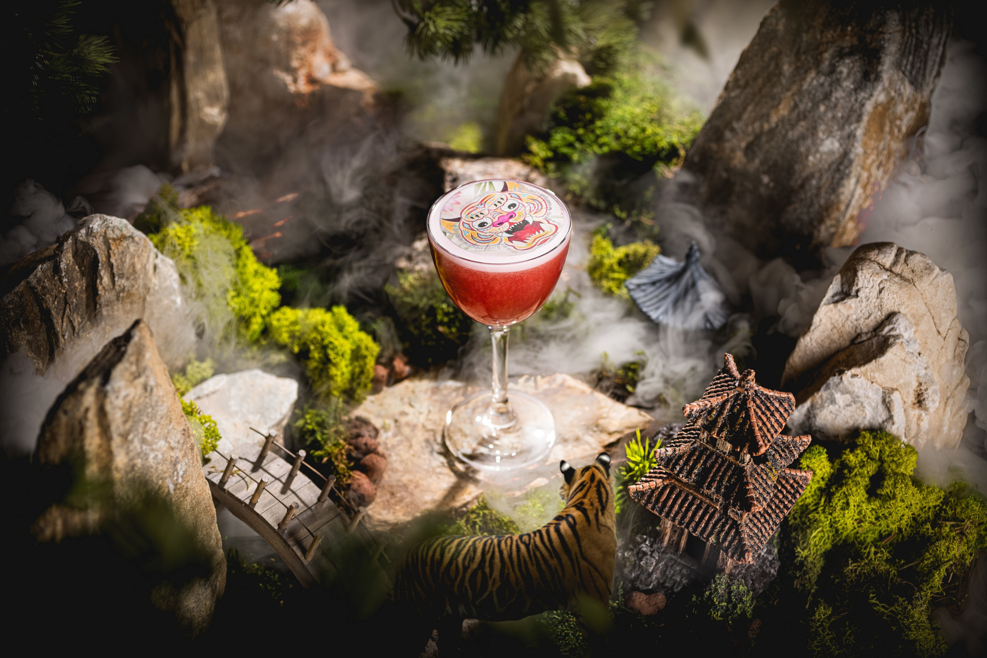 Year of the Tiger cocktail in miniature mountain set