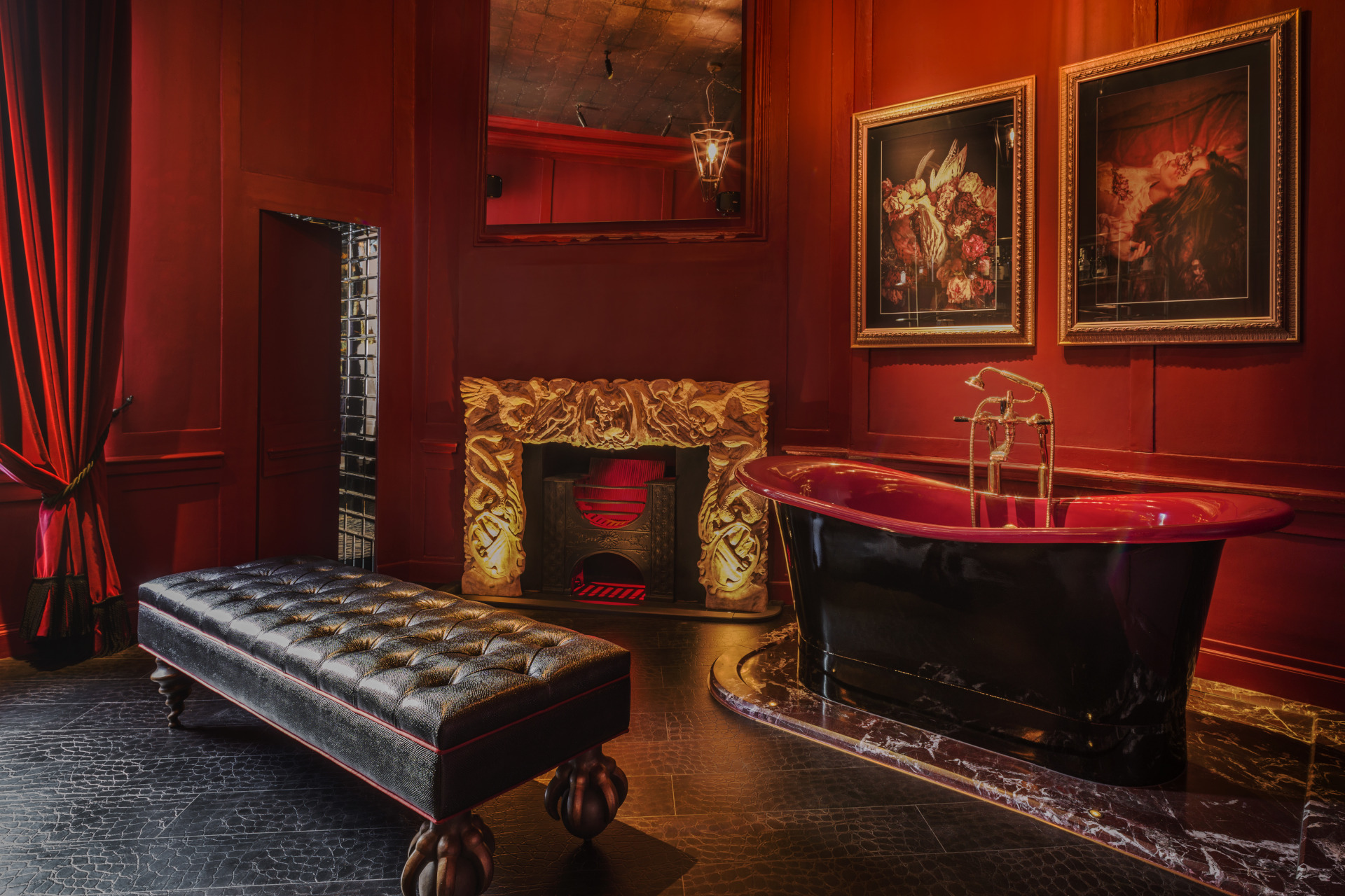 Bathroom with fireplace, foot stool and paintings