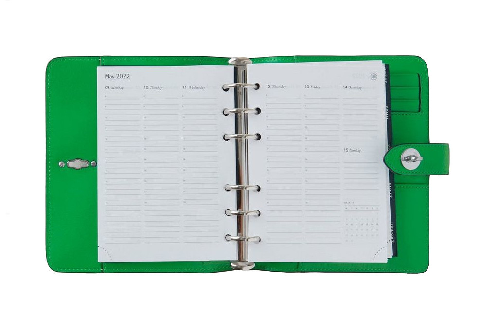 Planner in green binder
