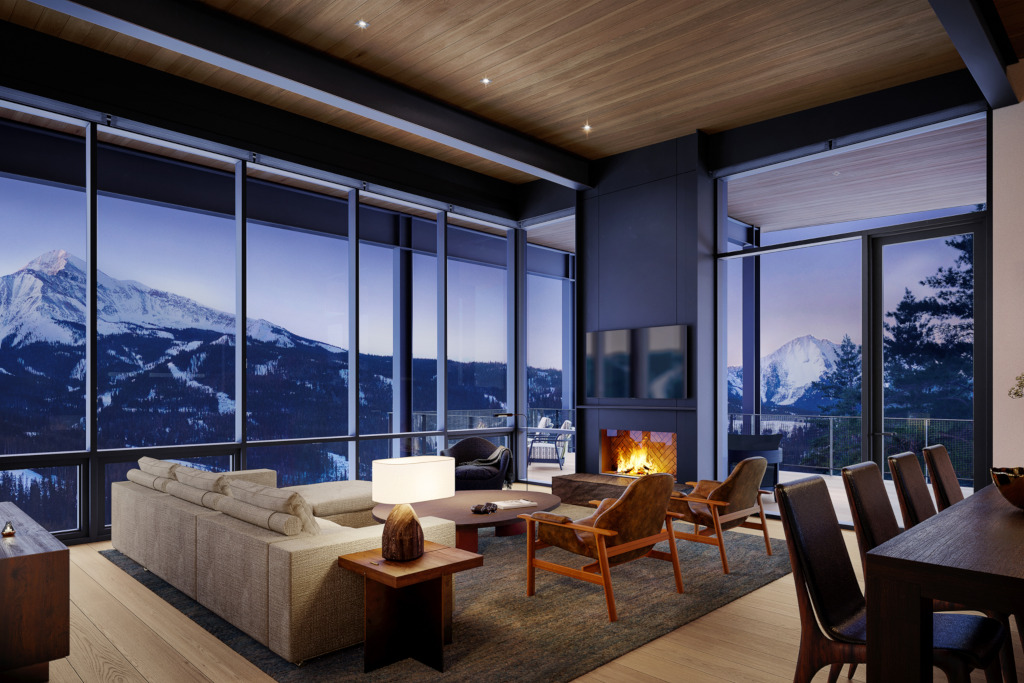 Sitting room with floor-to-ceiling windows overlooking the mountains
