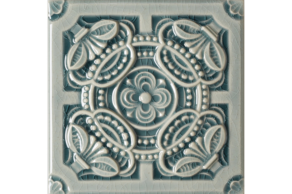 Intricate pale teal tile