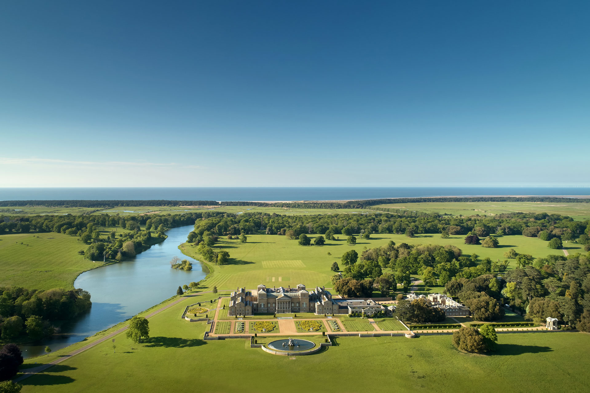 an aerial shot of Holkham Hall Estate