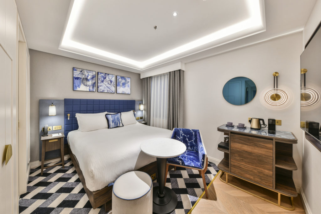 Creed Court Suite - blue hotel bedroom
